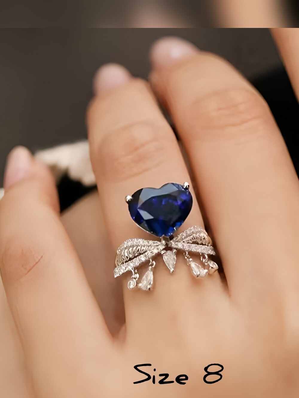 Gorgeous simulated Blue Sapphire heart dangling ring, Sz.8